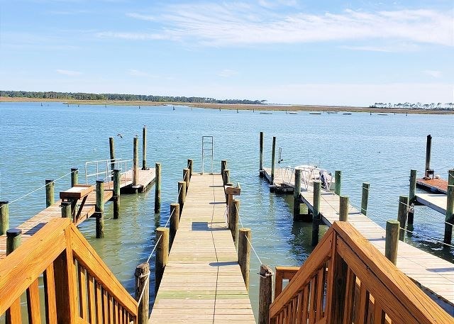 view of dock with a water view