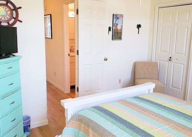 bedroom with a closet and light wood-type flooring