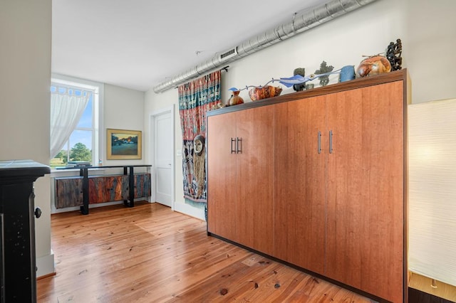 bedroom featuring light hardwood / wood-style floors