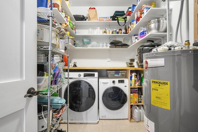 laundry room with light tile patterned floors and independent washer and dryer