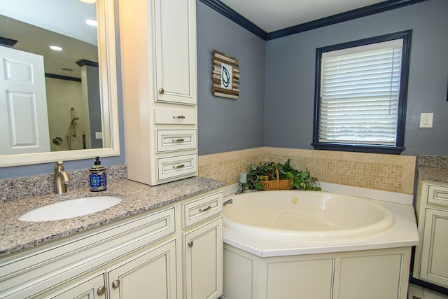 full bath featuring vanity, ornamental molding, a tile shower, and a bath