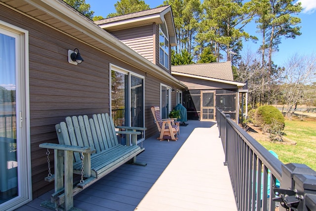 deck with a sunroom