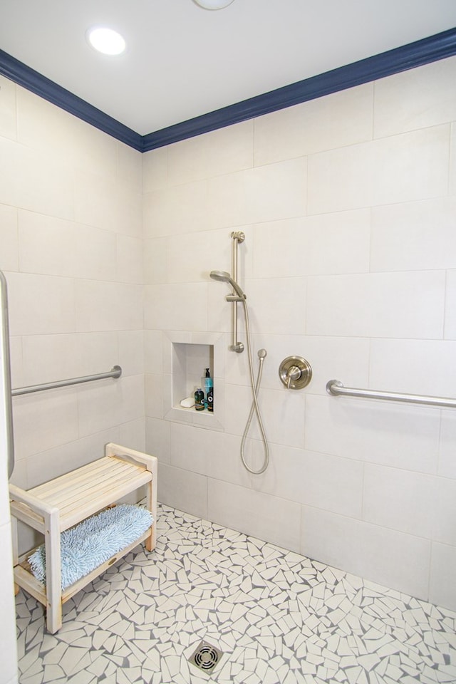full bath featuring a tile shower