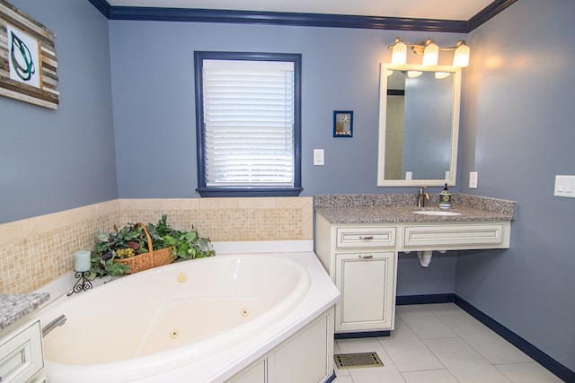 full bath with crown molding, vanity, a jetted tub, tile patterned flooring, and baseboards