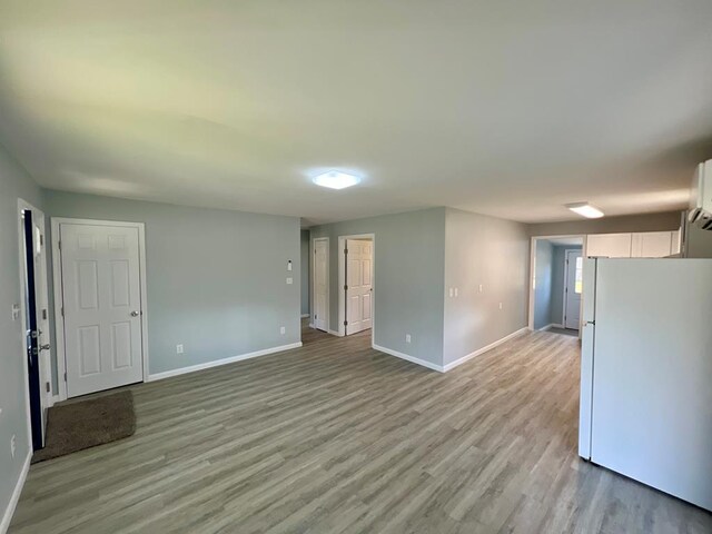 living room with light hardwood / wood-style flooring