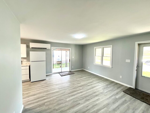 interior space with light hardwood / wood-style floors