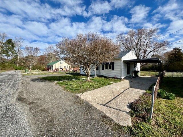 exterior space featuring a carport