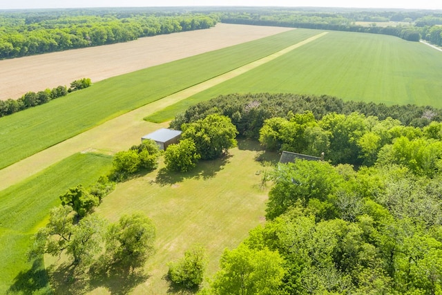 birds eye view of property featuring a rural view