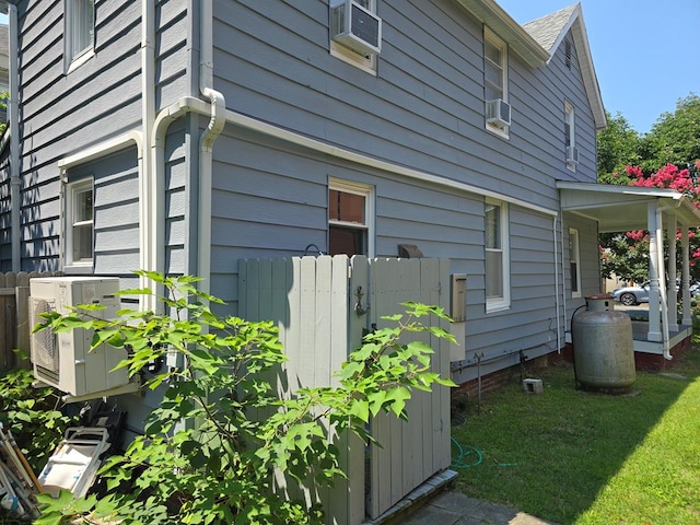 view of home's exterior with cooling unit