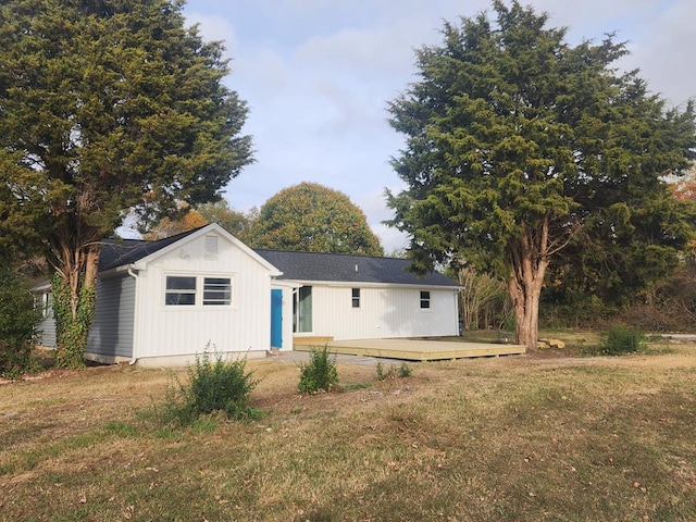 5065 Cobbs Station Rd, Cape Charles, VA 23310 - back of property with a wooden deck and a lawn