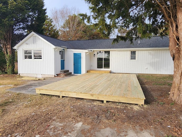 5065 Cobbs Station Rd, Cape Charles, VA 23310 - back of property featuring a deck and a shingled roof