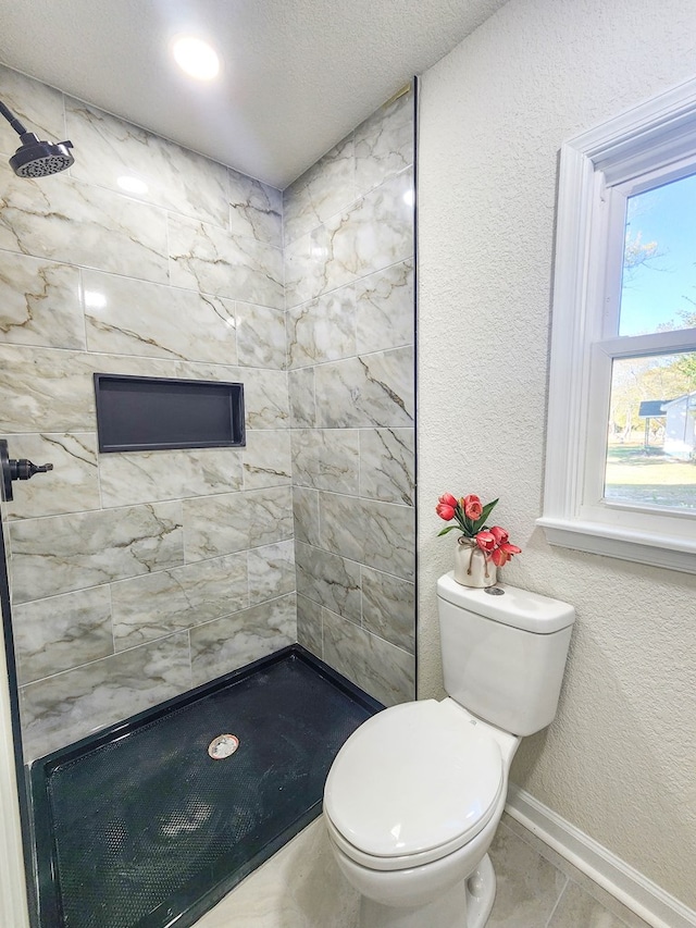 5065 Cobbs Station Rd, Cape Charles, VA 23310 - bathroom featuring tiled shower and toilet