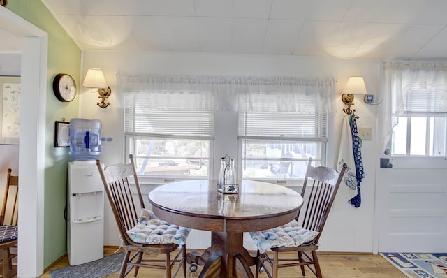 dining space featuring light wood-style flooring