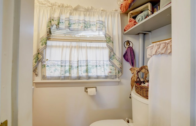 bathroom featuring toilet