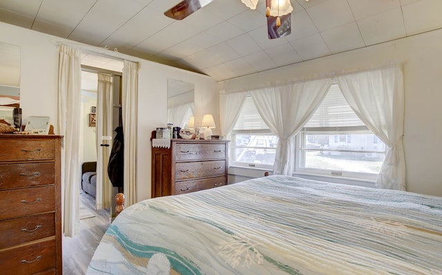 bedroom featuring lofted ceiling