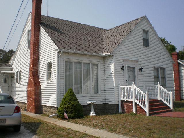 3533 Ridge Rd, Chincoteague, VA 23336 - view of front of house featuring a chimney