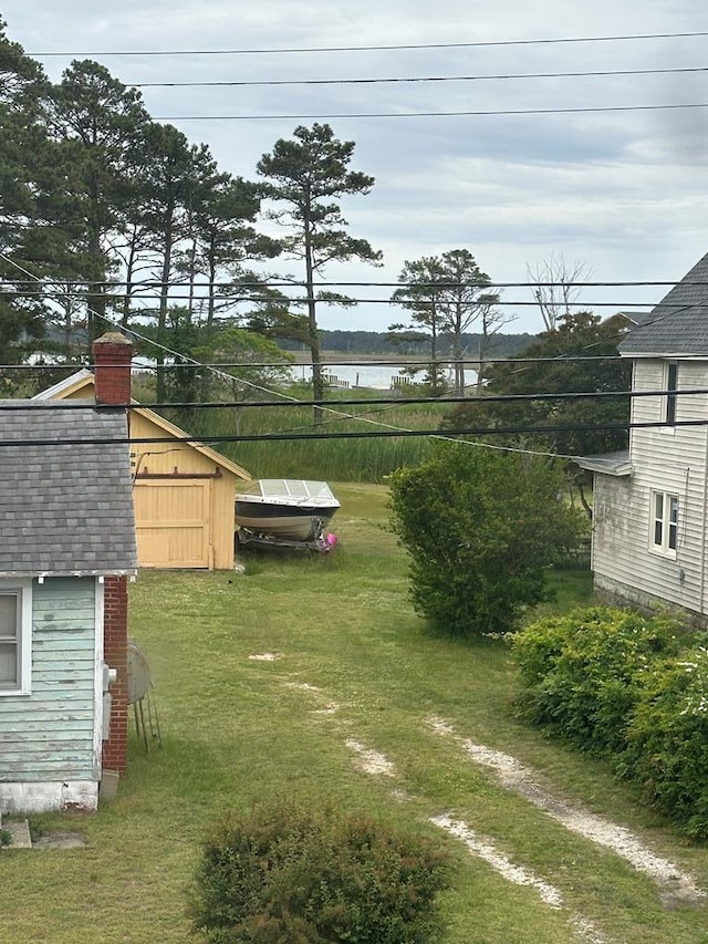 3533 Ridge Rd, Chincoteague, VA 23336 - view of green lawn with a water view