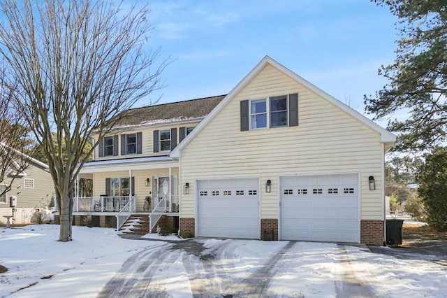 traditional-style home featuring brick siding, a porch, and an attached garage