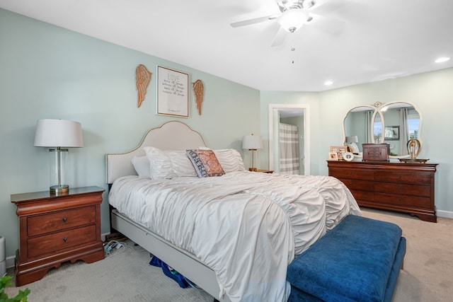 bedroom featuring connected bathroom, baseboards, ceiling fan, carpet, and recessed lighting