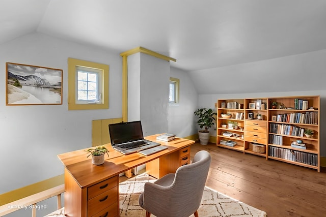 14457 Broadway Rd, Onancock, VA 23417 - office area featuring lofted ceiling, wood-type flooring, and healthy amount of natural light