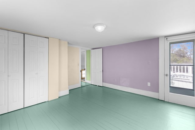 14457 Broadway Rd, Onancock, VA 23417 - unfurnished bedroom with access to outside and a closet