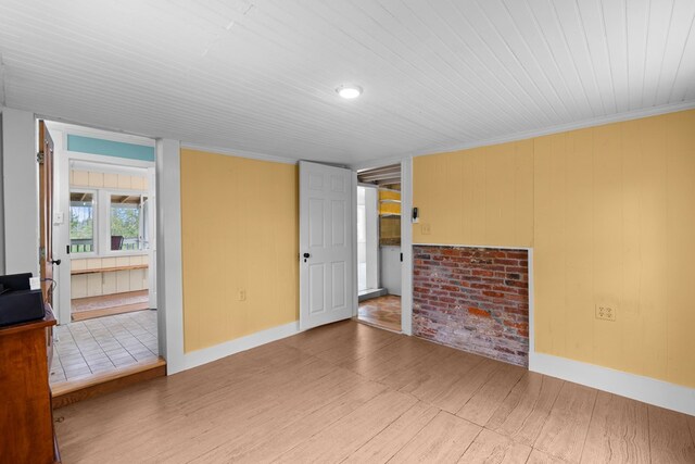 14457 Broadway Rd, Onancock, VA 23417 - unfurnished room with light wood-style floors, wood ceiling, and ornamental molding
