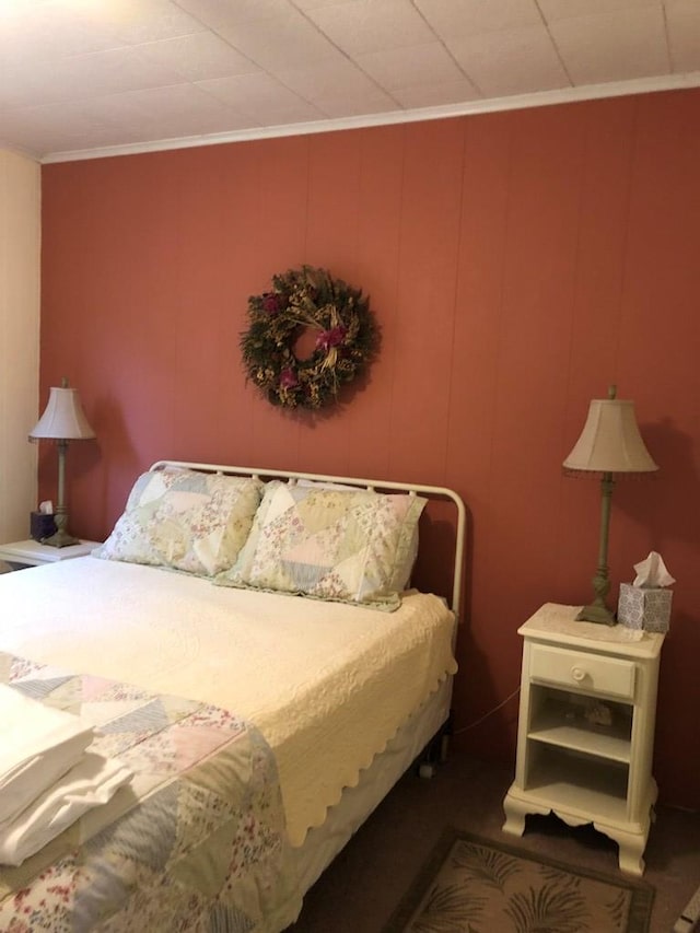 2561 Captains Corridor, Greenbackville, VA 23356 - bedroom with a decorative wall and ornamental molding