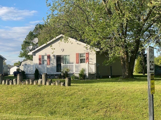 2561 Captains Corridor, Greenbackville, VA 23356 - view of front facade featuring a front lawn