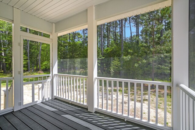 unfurnished sunroom with a healthy amount of sunlight