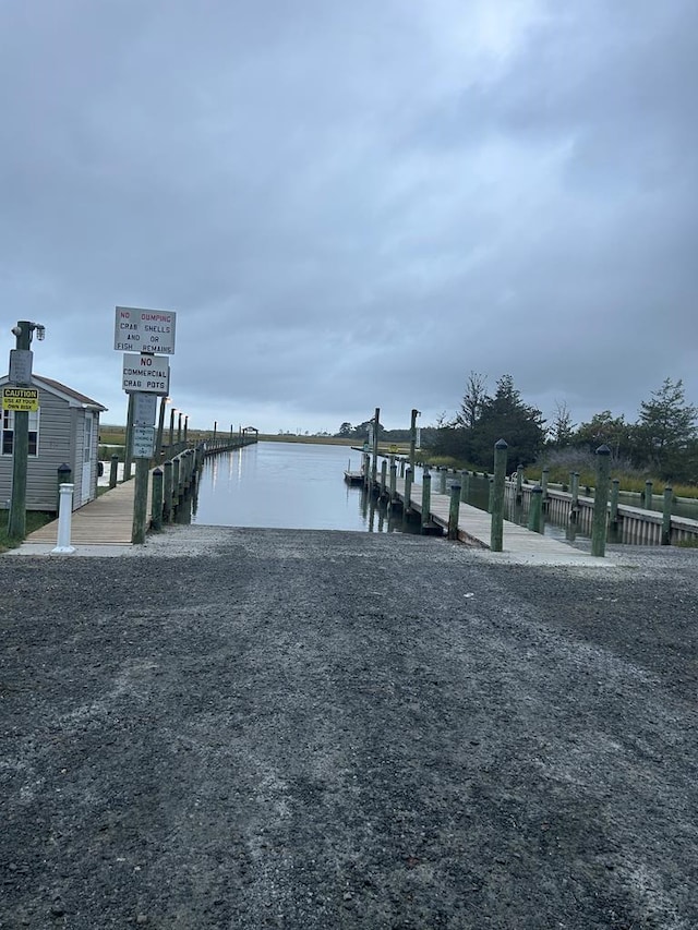 dock area featuring a water view