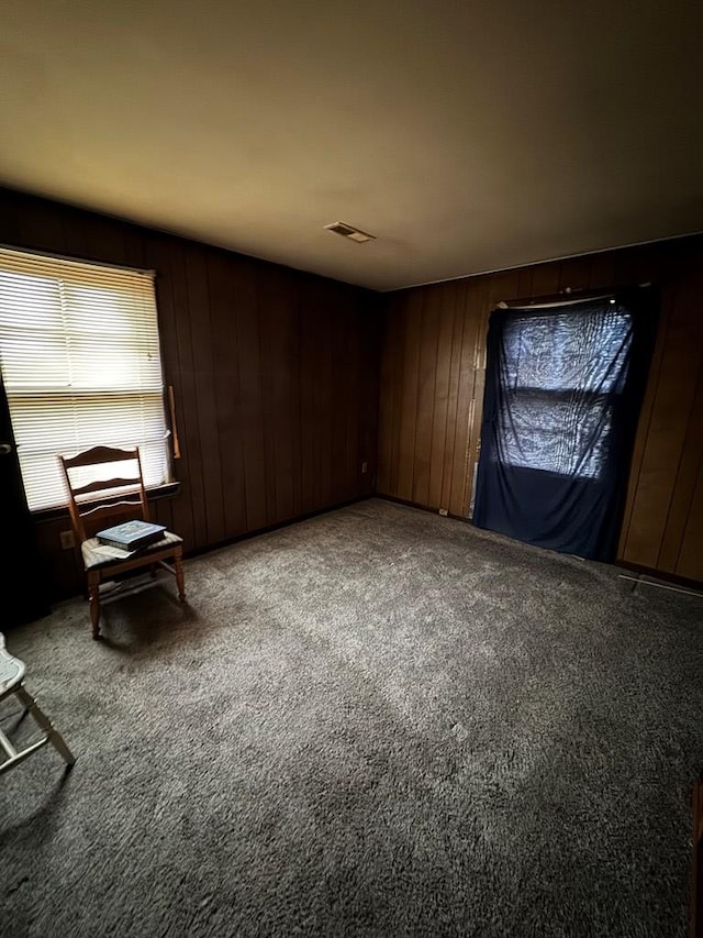 interior space featuring wood walls