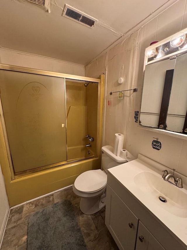 full bathroom with vanity, toilet, and combined bath / shower with glass door