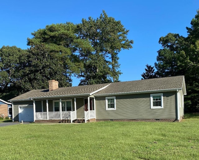 single story home featuring a porch, a garage, and a front lawn