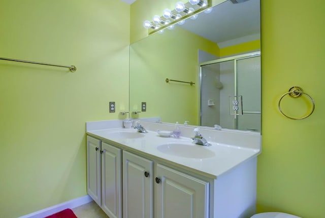 6180 Marsh Island Dr, Chincoteague, VA 23336 - full bathroom with a stall shower, double vanity, and toilet