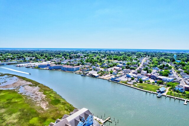 6180 Marsh Island Dr, Chincoteague, VA 23336 - aerial perspective of suburban area with a nearby body of water