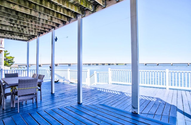 6180 Marsh Island Dr, Chincoteague, VA 23336 - dock with outdoor dining area and a deck with water view