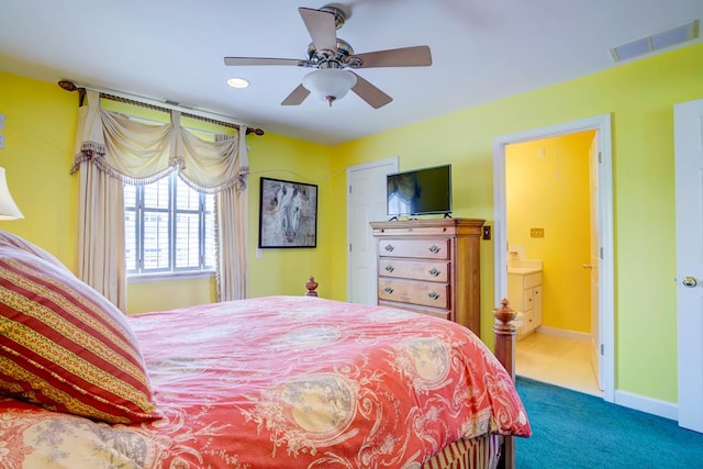 6180 Marsh Island Dr, Chincoteague, VA 23336 - carpeted bedroom featuring baseboards, ensuite bathroom, recessed lighting, and ceiling fan