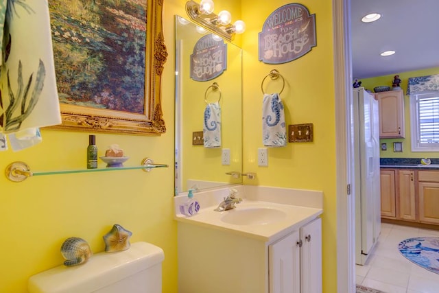 6180 Marsh Island Dr, Chincoteague, VA 23336 - bathroom featuring vanity, tile patterned flooring, toilet, and recessed lighting