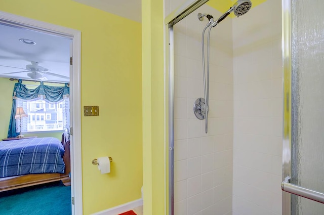 6180 Marsh Island Dr, Chincoteague, VA 23336 - ensuite bathroom featuring a stall shower and a ceiling fan