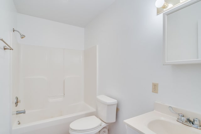 bathroom with toilet, tub / shower combination, and vanity