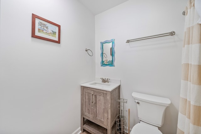 full bathroom with vanity and toilet