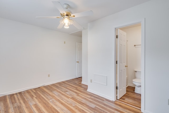 unfurnished bedroom featuring light wood-style floors, baseboards, and ceiling fan