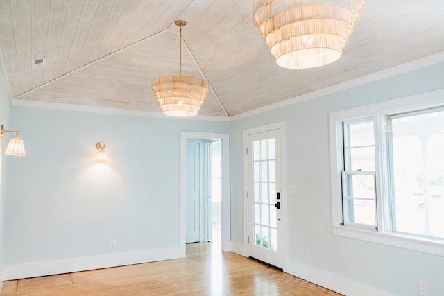 interior space featuring wood ceiling, baseboards, wood finished floors, and lofted ceiling