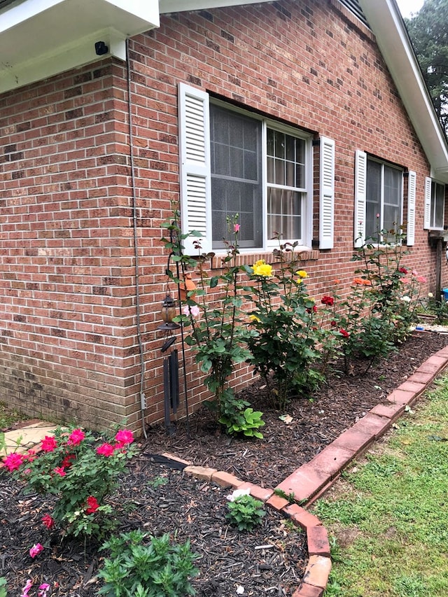 21020 Adams Rd, Greenbush, VA 23357 - view of side of property featuring brick siding