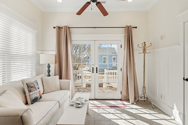 living room featuring recessed lighting, ornamental molding, and a ceiling fan