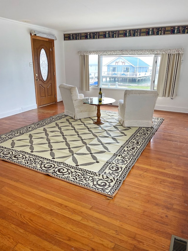 entrance foyer featuring hardwood / wood-style flooring