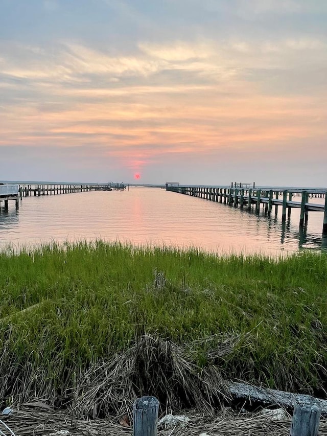 dock area featuring a water view