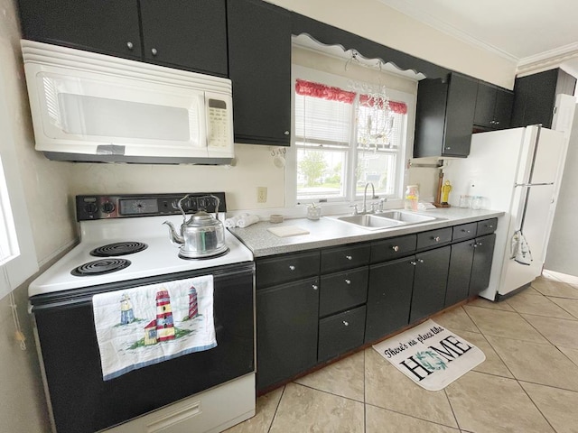 kitchen with crown molding, sink, light tile patterned floors, and white appliances