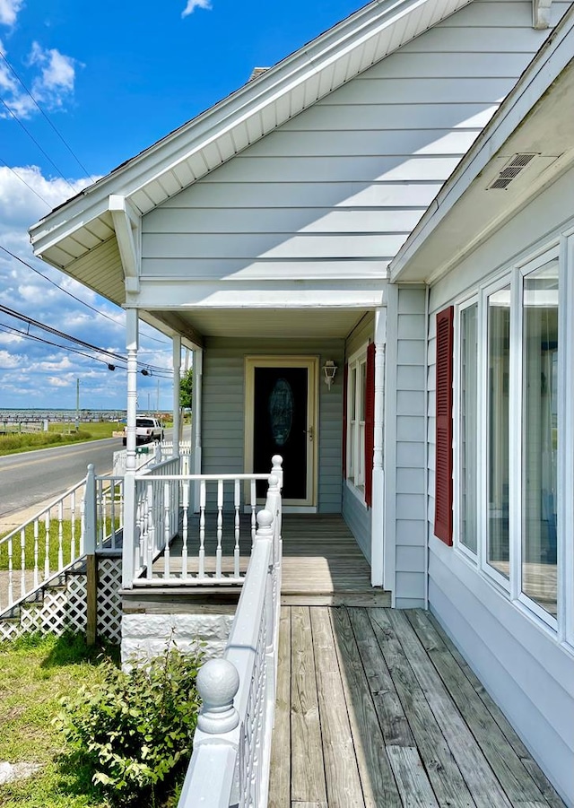 wooden terrace with covered porch