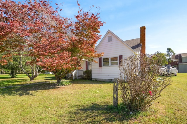 exterior space with a lawn